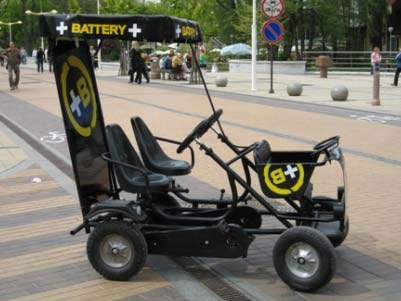 Reklama ant velomobilių, elektromobilių