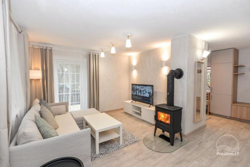 4 vietų apartamentai PRIE KOPOS su terasa bei židiniu