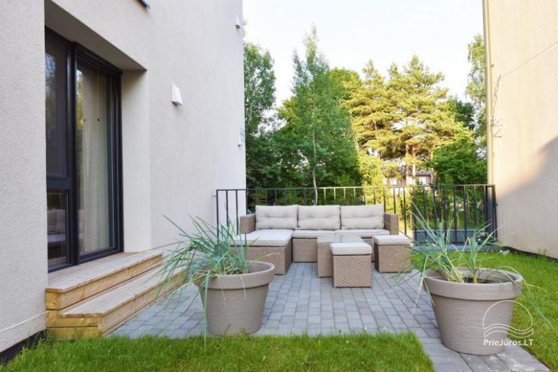 Apartamentai su baseinu bei terasa Malūnų Vilose Palangoje