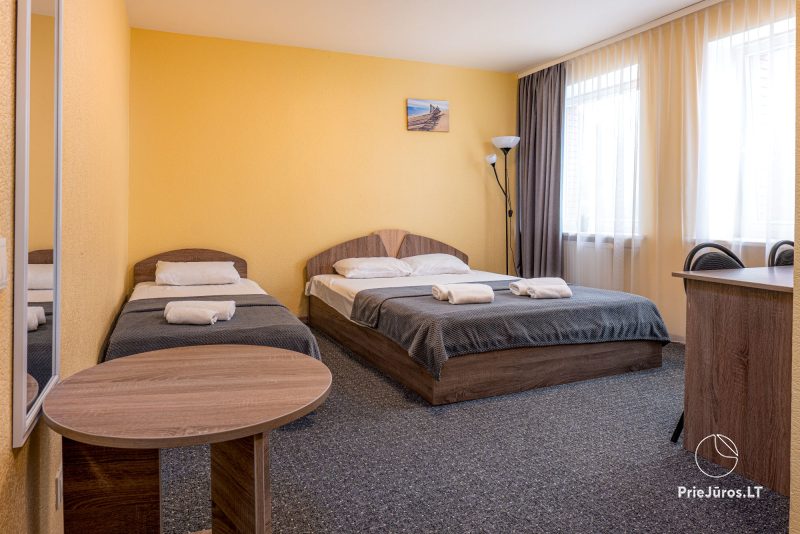 Poilsio namai Relax Palanga - jaukių kambarių nuoma. Yra pirtis, baseinas