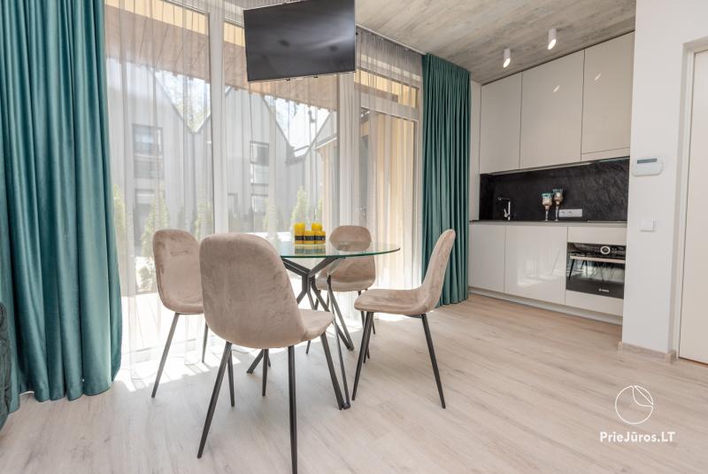 New apartment with terrace and heated pool near the sea