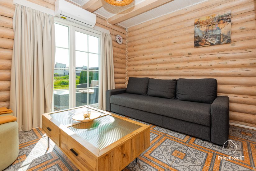 Apartamentai rąstiniame name su atskiru įėjimu ir terasa „Šventosios liuksas“