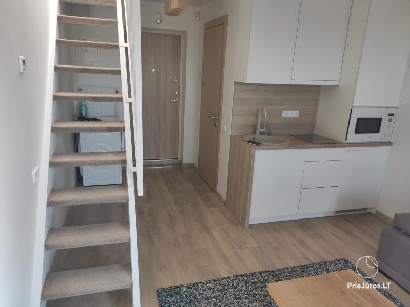 Malūno Vilos 2 kambarių apartamentai (1 kambarys antresolėje) su baseinu P.Nr.14