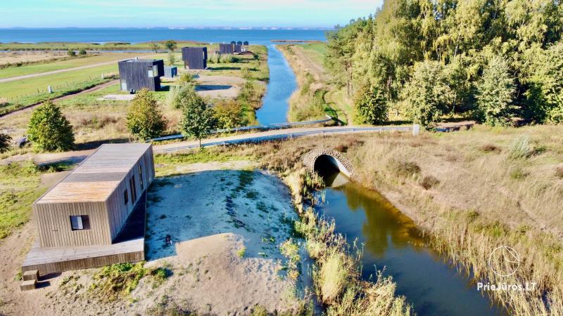 Išskirtinės architektūros namai Svencelėje netoli Kuršių Marių kranto su nuosavu paplūdimiu