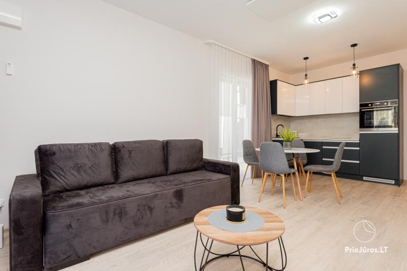 Erdvūs Stella Maris apartamentai su šildomu baseinu Mano jūra 2 komplekse, Kunigiškiuose