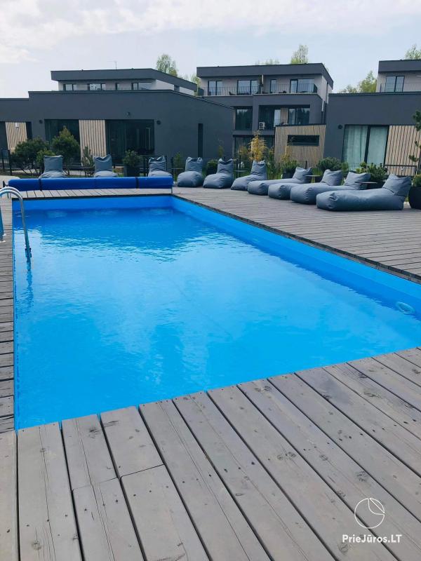 Erdvūs Stella Maris apartamentai su šildomu baseinu Mano jūra 2 komplekse, Kunigiškiuose