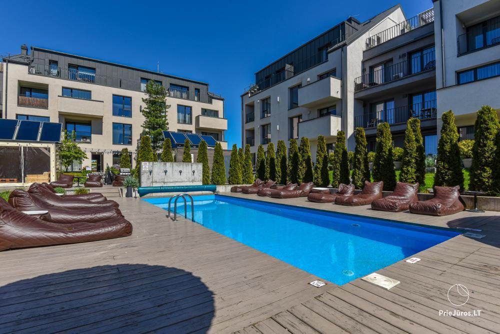 Nuomojami apartamentai su terasa Malūno vilose ir apartamentai Emira Palangos centre