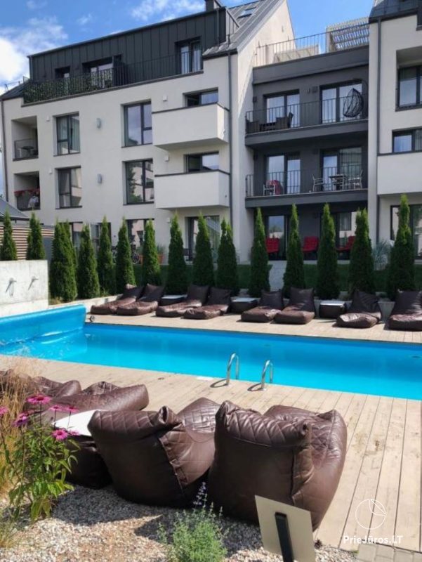 Apartamentai Malūnų vilos su vaizdu į baseiną ir terasą