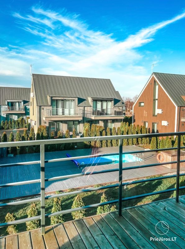 Dviejų aukštų apartamentai su šildomu lauko baseinu