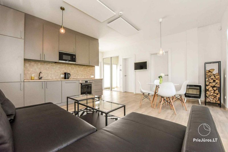 Namo nuoma Kunigiškėse su terasa ir masažiniu lauko kubilu.