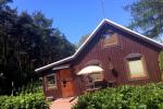 Cosy wooden house for rent in Smiltyne, surrounded by pine forest