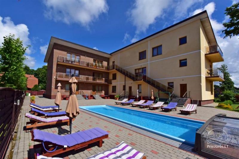 „IEVŲ VILA“ – geriausias šeimų poilsis Palangoje! Didelis kiemas, šildomas baseinas